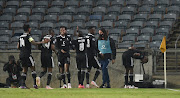 Tshegofatso Mabasa of Orlando Pirates celebrates goal with team mates during the DStv Premiership match between Orlando Pirates and Black Leopards at Orlando Stadium on May 06, 2021 in Johannesburg, South Africa. 
