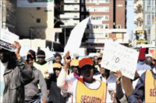 HOME AND DRY: Hillbrow residents marched to the Johannesburg high court yesterday in a protest against alleged fraud and corruption at the deeds office after losing their homes allegedly because they had not paid their levies. Pic. Vathiswa Ruselo. 12/06/08. © Sowetan.