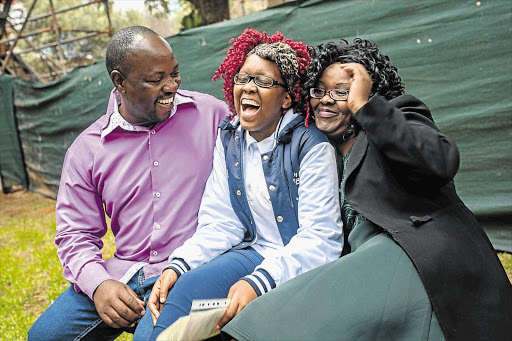 Kamogelo Tswai, 20, of Alexandra, northern Johannesburg, a pupil of the Mitzvah School in Morningside, got seven matric distinctions. With her are her father, Elliot, and mother, Veronica. File photo
