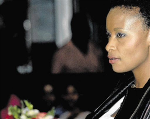 Clearing the air: Actress and author Bonnie Henna shares her life experiences at the launch of 'Eyebags and Dimples'. Henna lives in Cape Town and is forthright about her battle with depression PHOTO: BONGANI MNGUNI