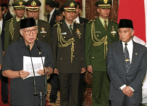 Muhammad Suharto on the left.