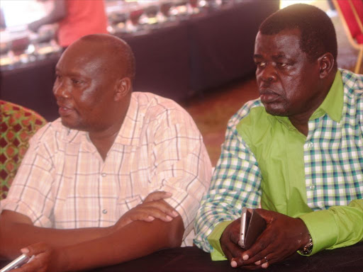 Busia Governor Sospeter Ojaamong and Senate candidate Okiya Omtatah during a NASA candidates meeting ahead of Raila Odinga's rallies, June 23, 2017. /JANE CHEROTICH