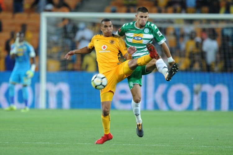 Ryan Moon of Chiefs in action with Lorenzo Gordinho of Celtics during the Absa Premiership match between Kaizer Chiefs and Bloemfontein Celtic at FNB Stadium on February 24, 2018 in Johannesburg, South Africa.