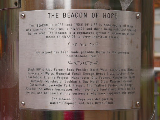 Plaque attached to SJ8497 : The Beacon of Hope. THE BEACON OF HOPE The 'BEACON OF HOPE' and 'TREE OF LIFE' is dedicated to all those who have lost their lives to HIV/AIDS and those living with it...