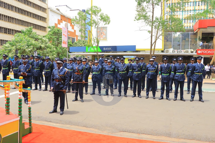 Officers from Nairobi City County inspectorate line up outside City Hall ready to receive Governor Johnson Sakaja ahead of his County Assembly address on the status of the county on April 4, 2024