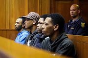 Vernon Witbooi‚ Geraldo Parsons‚ Eben van Niekerk and Nashville Julius (form left) were sentenced on Monday for the murder of Stellenbosch student Hannah Cornelius.