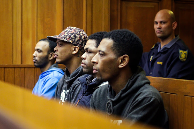 The men found guilty of murdering and raping Hannah Cornelius - pictured here, from left, Vernon Witbooi‚ Geraldo Parsons‚ Eben van Niekerk and Nashville Julius - will be sentenced on Monday.