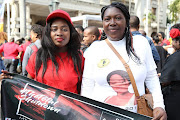 Senamile (left) and Zama Khumalo, the sisters of murdered student Zolile Khumalo, took part in the #TotalShutdown march in Durban on August 1, 2018.