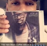 Swizz gives the thumbs up to Black Coffee.
