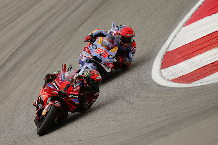 Francesco Bagnaia (1) leads Marc Marquez (93) during the Portuguese Grand Prix. The two riders would later collide, resulting in both not being able to finish the race.