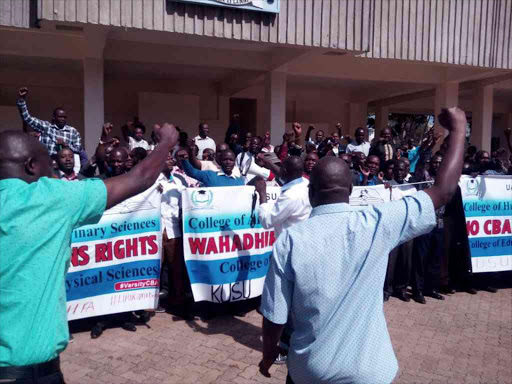 Lecturers at the University of Nairobi at the start of their strike on Janaury 19, 2016. /EMMANUEL WANJALA