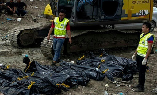 Five more Indonesian bodies wash ashore in Malaysia after boat tragedy