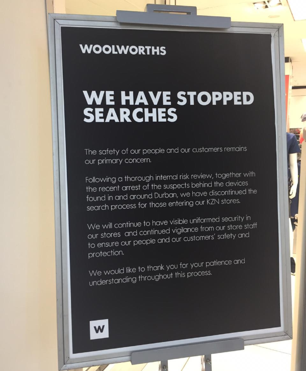 A notice outside the Woolworths store in Durban's Musgrave Centre notifying shoppers that bag searches have been discontinued.