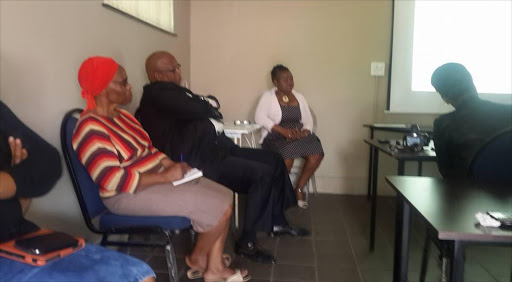 Mayor of the ANC-controlled Umzinyathi District municipality, James Mthethwa (wearing black and folding his arms) at the launch of the Umzinyathi Community Health Work Training Project, held in Dundee on August 24, 2015.