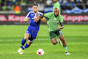 LONG JOURNEY  BACK TO PSL CONTENTION: Supersport United's  Dean Furman and exiting  Orlando Pirates' Oupa Manyisa  fight for  possession of the ball  during the Nedbank Cup final in  June.