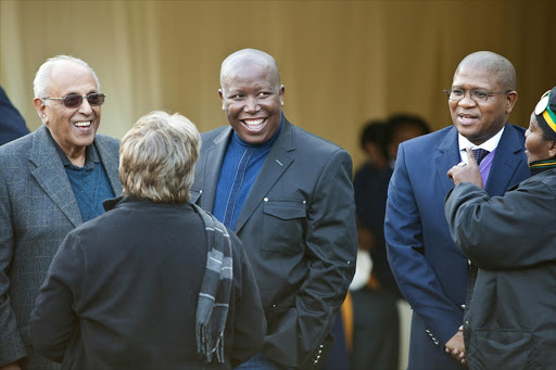 Ahmed Kathrada (l), Julius Malema (C) along with Fikile Mbalula (R) outside Albertina Sisulu's house after paying respects to the family. Pic. Halden Krog. 06/06/2011.