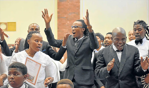 MAJOR BOOST: Graduates celebrate their Level 4 certificate in community development from Rhodes University. The provincial social development department spent almost R6-million to assist the students in their training Picture: SUPPLIED