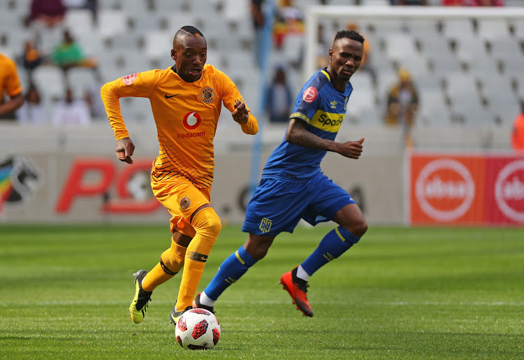 Kaizer Chiefs' star forward Khama Billiat (L) pulls away from Teko Modise of Cape Town City during the Absa Premiership at Cape Town Stadium, Cape Town, September 15 2018.