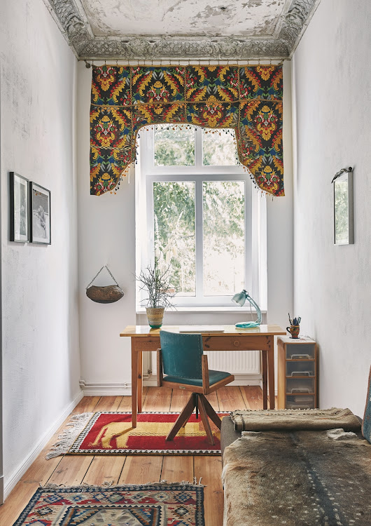 Rugs add character and warmth to the study.