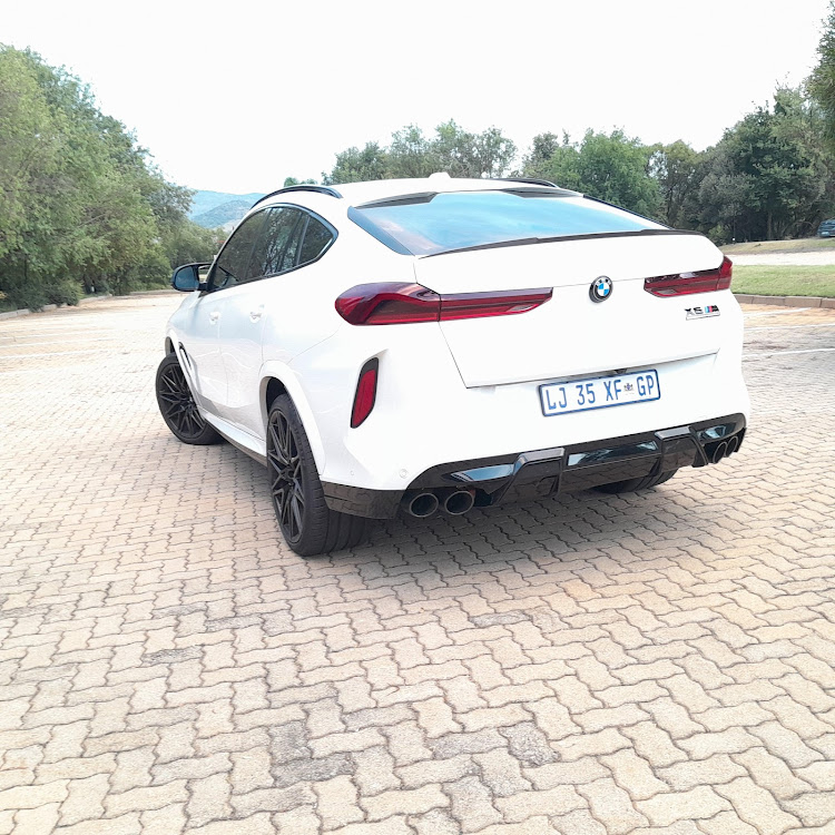 The X6M Competition's sleek, low roof line compromises true family functionality. Picture: PHUTI MPYANE