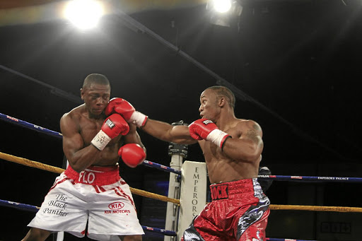Flo Simba exchanges blows with Thabiso Mchunu. Simba is returning to action against Joshua Pretorius on Thursday after a hiatus of three years due to his medical condition. / Bafana Mahlangu
