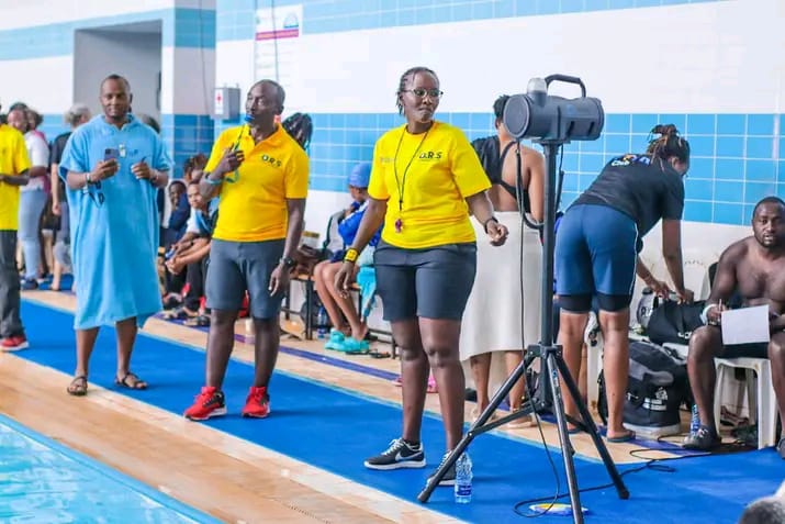 Collins Marigiri, Secretary General Kenya Aquatics and Monica Githinji from Kiambu Aquatics officiating during the recent Nationals Masters Swimming Championshi