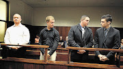 DOCK OF THE BAY: Durban brothers Blayne and Kyle Shepard, Andries van der Merwe and Dustin van Wyk stand trial for the murder of former Royal Marine Brett Williams. They allegedly beat Williams to death after a Super 15 rugby match at Kings Park Stadium last year