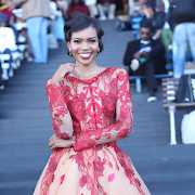 Miss World SA Thulisa Keyi was blushing in red at The Vodacom Durban July earlier this year.