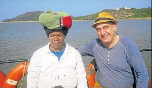 CROSSING THE KEI: Israeli ambassador Arthur Lenk on the pont off Kei Mouth with a local hawker who identified herself as ‘Machine’