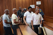 Muzi Sibiya , Fisokuhle Ntuli, Mthokioziseni Maphisa Sibiya  and  Mthobisi Mncube accused of killing former Bafana Bafana keeper Senzo Meyiwa in the dock at Pretoria High Court. 