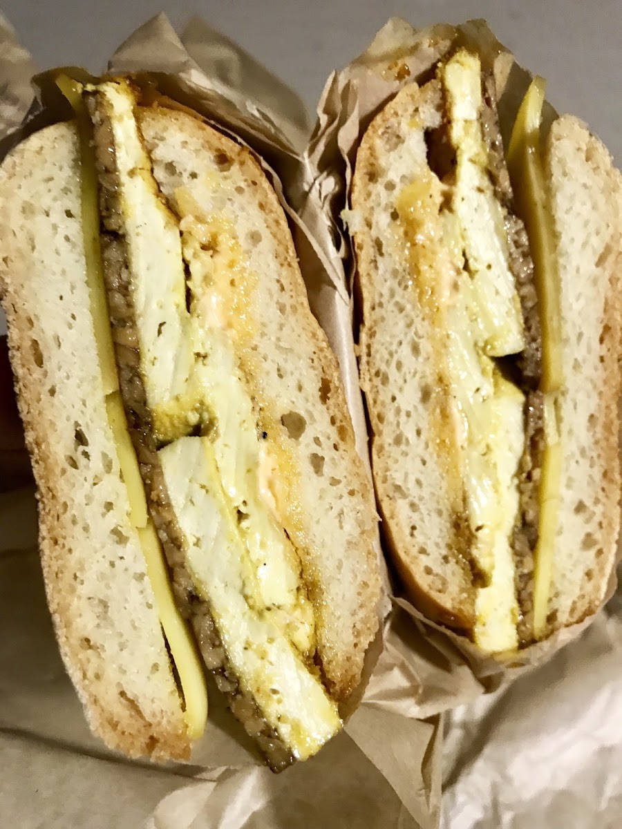 “The Bowery”. Tofu, smoky tempeh, and cheese vegan breakfast sandwich. With spicy mayo.  Yum!