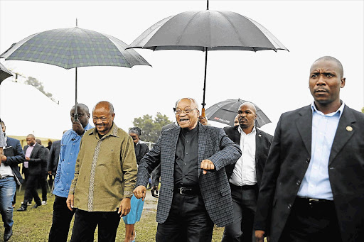 COVER-UP: President Jacob Zuma and KwaZulu-Natal Premier Senzo Mchunu in Melmoth yesterday.