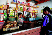  Nomsa Maleka in this file image  runs her spaza shop largely by extending credit to grant recipients.