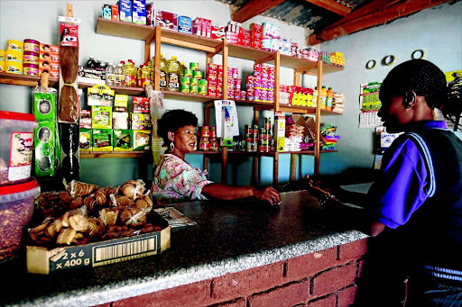 STRUGGLING: Nomsa Maleka in this file image runs her spaza shop largely by extending credit to grant recipients Photo: Simon Mathebula