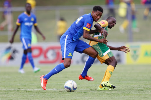 Bongani Zungu of Sundowns battles Rodney Ramagalela of Golden Arrows during the Absa Premiership match between Golden Arrows and Mamelodi Sundowns at Chatsworth Stadium. Picture Credit: Gallo Images