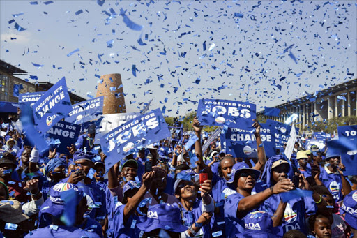 File Photo: Hundreds of supporters of South Africa's main oppostion party Democratic Alliance (DA) gather at the Walter Sisulu Square in Kliptown, Soweto, to attend a concert. AFP PHOTO