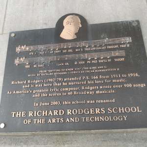 Plaque has music and lyrics to a song from the King and I and dedication to Richard Rodgers who attended the school from 1911 to 1916.