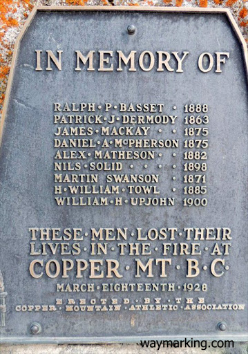 Near the centre of the Princeton cemetery stands a stone cairn with a bronze plaque affixed, a memorial to the nine men killed in a bunkhouse fire in 1928 at Copper Mountain.(full page)Plaque...