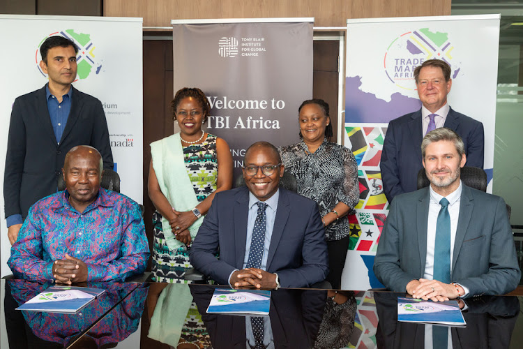 (Seated) Trade Catalyst Africa Chairperson Patrick Obath, Tony Blair Institute Managing Director Rishon Chimboza, TMA CEO Dave Beer (Standing) TMA Senior Director for Infrastructure Abhishek Sharma, TMA Chief of Programmes Allen Asiimwe, TBI Kenya Country Director Lisa Karanja and TBI Director Trade and Infrastructure Frank Matsaert during the MoU Signing.