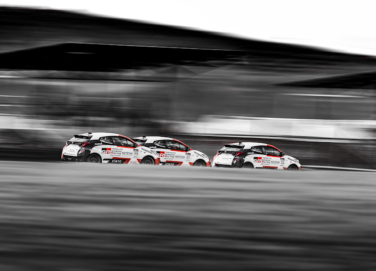 TimesLIVE's Thomas Falkiner (111) chases down Mark Jones (23) and Sean Nurse (33) in the first heat of Saturday's Toyota GR Cup at Zwartkops Raceway.