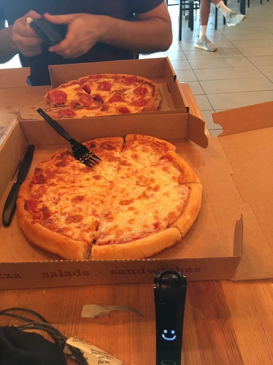 I could not choose between cheese and pepperoni.  Nima smiled.