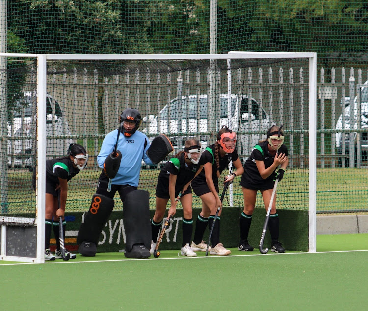 The Pearson U16 team line up to defend a penalty corner during a match in their U16 hockey tournament at the weekend