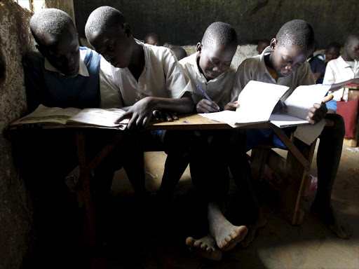 Students attend a class session at the Senator Obama primary school in Nyangoma village in Kogelo, west of Kenya's capital Nairobi, June 23, 2015. Photo Reuters