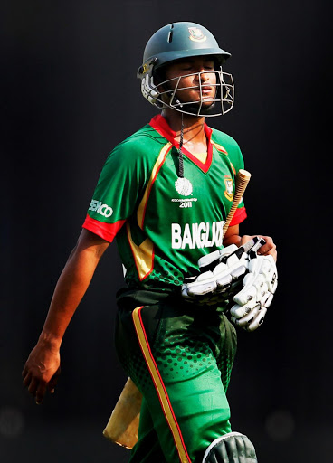 Captain Shakib Al Hasan of Bangladesh walks back to the pavillion after being dismissed by Robin Peterson of South Africa during the ICC World Cup Cricket Group B match between Bangladesh and South Africa at Shere-e-Bangla National Stadium on March 19, 2011 in Dhaka, Bangladesh