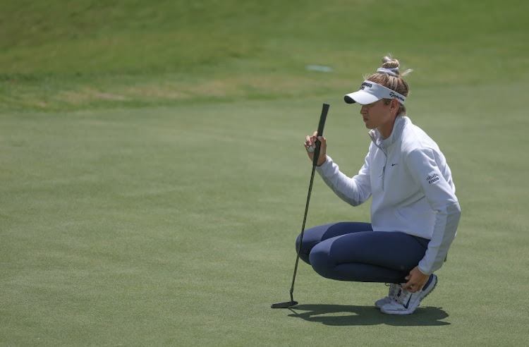 Nelly Korda (US) reads the seventh green during the final round of The Chevron Championship at The Woodlands, Texas on April 21, 2024