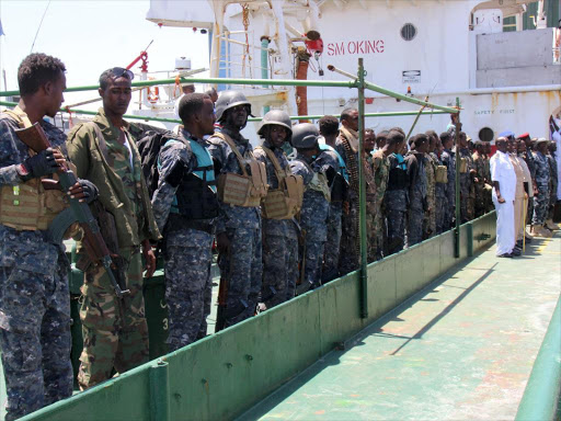 Maritime police are seen aboard oil tanker Aris-13, which was released by pirates, as it sails to dock on the shores of the Gulf of Aden in the city of Bosasso, northern Somalia's semi-autonomous region of Puntland, March 19, 2017. /REUTERS