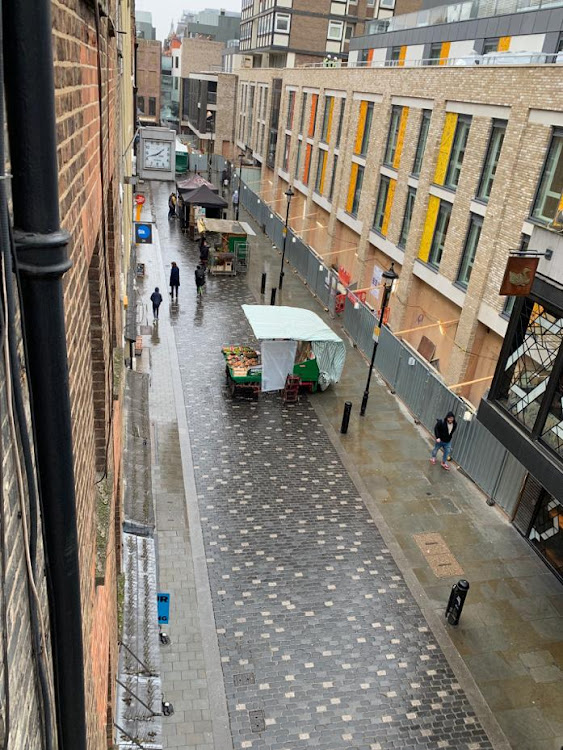 The view of the Berwick Street Market outside my window today.