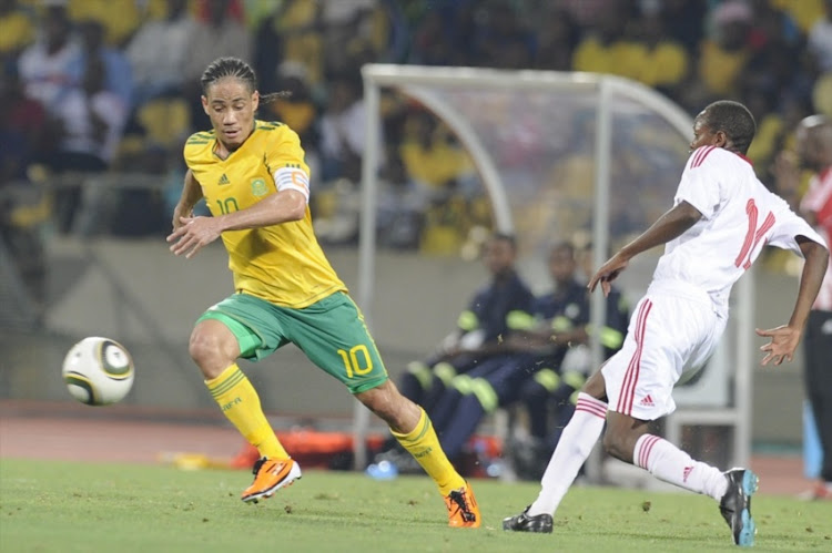 Steven Pienaar and David Gateri during the International friendly match between South Africa and Kenya at Royal Bafokeng Stadium on February 09, 2011 in Rustenburg.