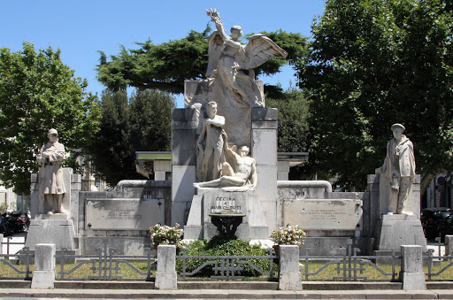 Monumento Ai Caduti Di Cecina Monument To The Fallen Of Cecina I have close ups of the plaques but chose to post a photo of the overall statue. Impressive stuff. Left side plaque reads:' A ricordo...