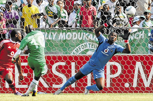 Clifford Mulenga (10) of Bloem Celtic beats Orlando Pirates' keeper Senzo Meyiwa during the Absa Premiership match at Free State Stadium in Bloemfontein yesterday. The loss brought Pirates back to earth following their Telkom Knockout Cup victory